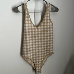 Never worn body suit